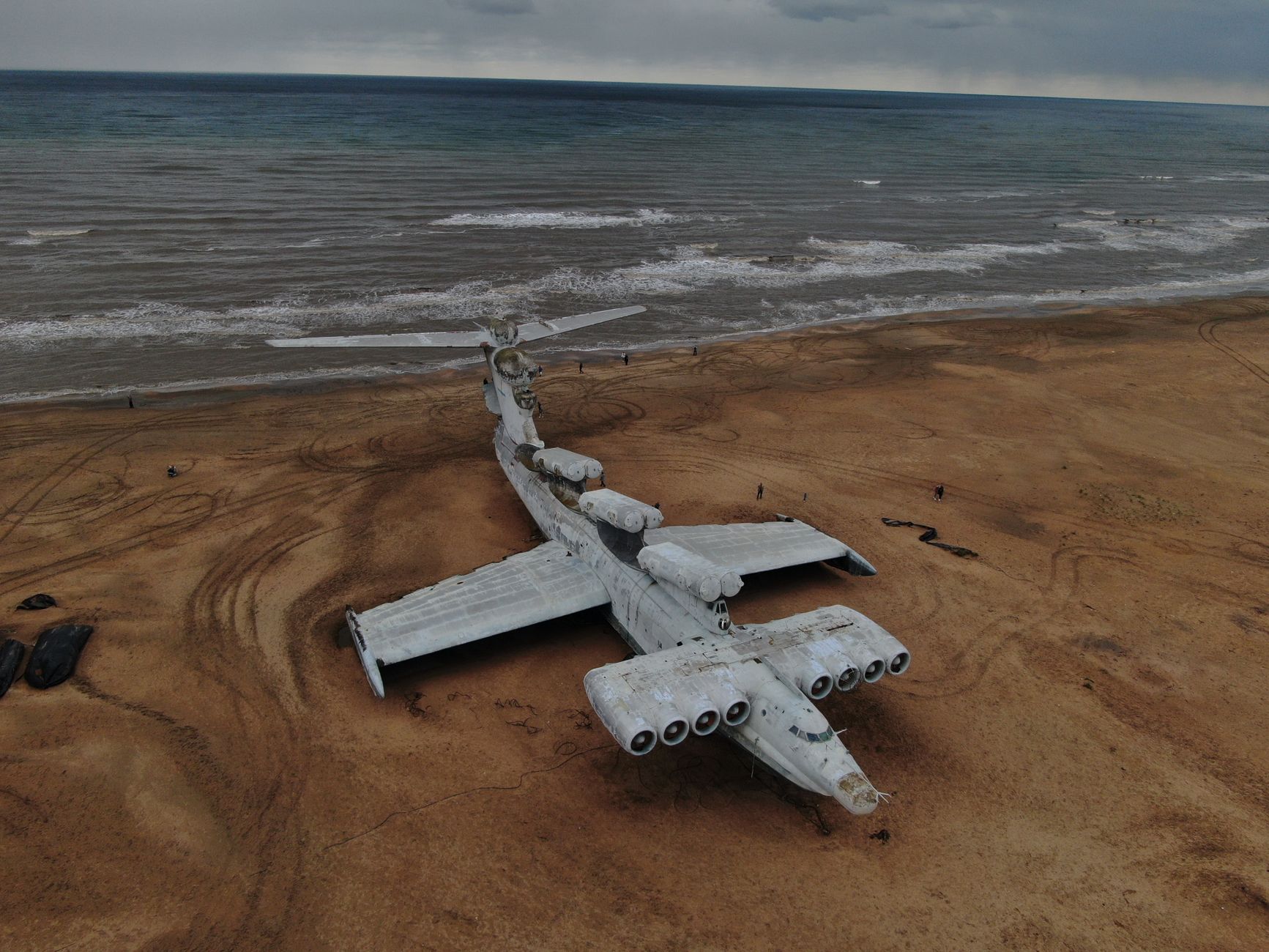 Aerial view of an abandoned Soviet ekranoplan on a beach in Dagestan, Russia.